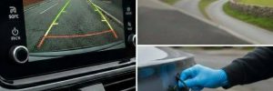 Reverse camera installation in Manchester being performed by a mobile technician to provide a vehicle with a professional parking assistance upgrade.